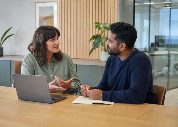 Employee and manager discussing practical reasonable adjustments together